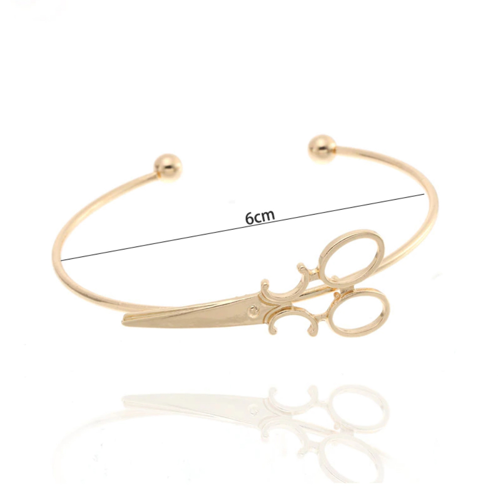 Steampunk armband 2, kleur goud, met schaar